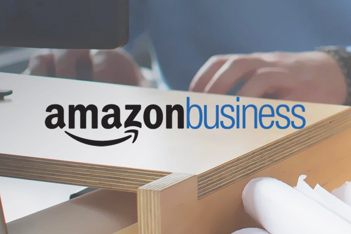 Amazon Business header image with wood background and hands, representing digital procurement growth. Featured in article by Sean Brownlee on how certified small and diverse businesses achieve success with Amazon Business.