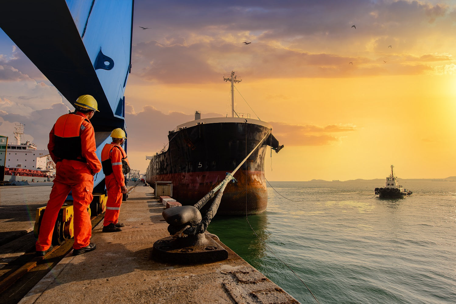 Ship docked at port, symbolizing government procurement and supply chain logistics, featured in Sean Brownlee’s article on connecting small business sellers to government buyers.