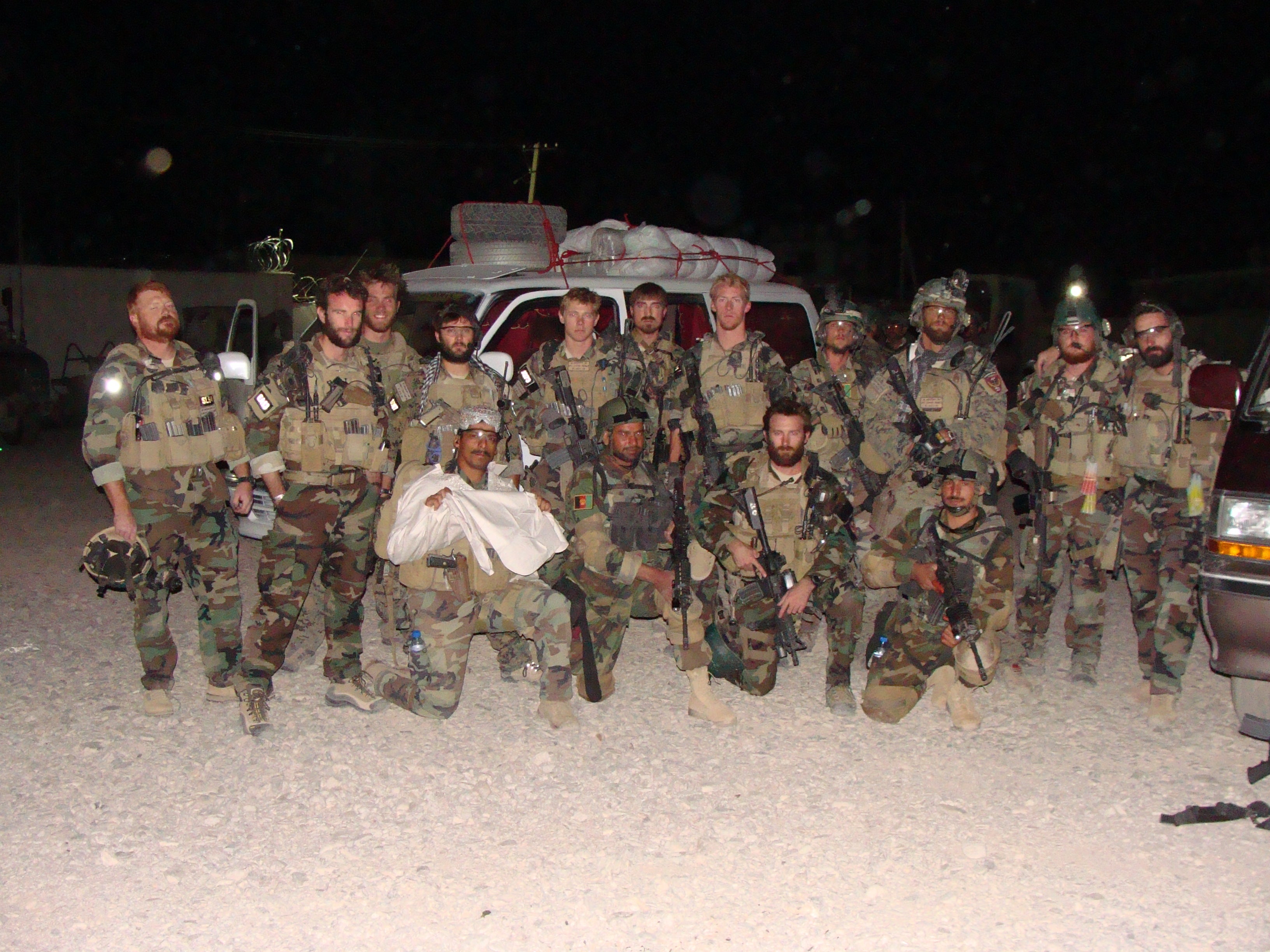 Sean Brownlee with fellow Marine Raiders staged before a mission in Afghanistan.