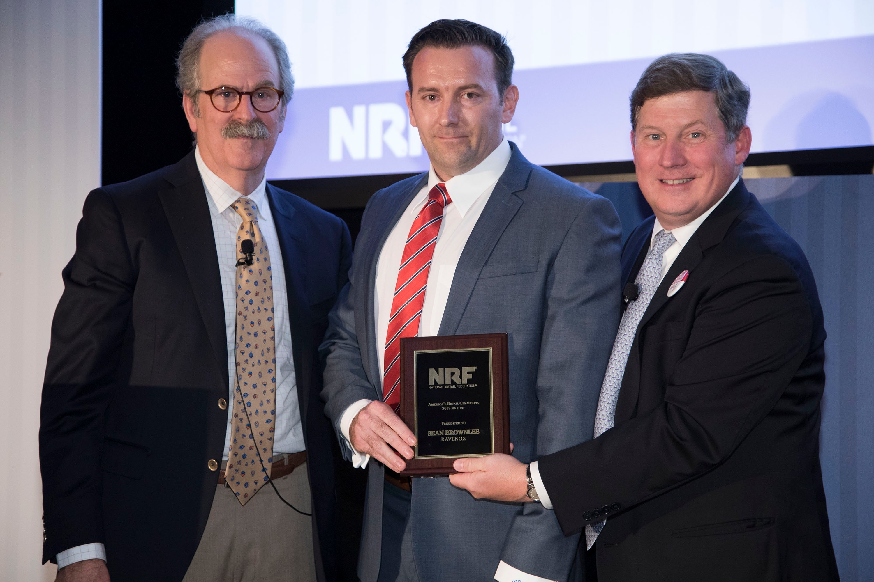 Sean Brownlee receiving the NRF America’s Retail Champion Award as a 2018 finalist at the Retail Advocates Summit.